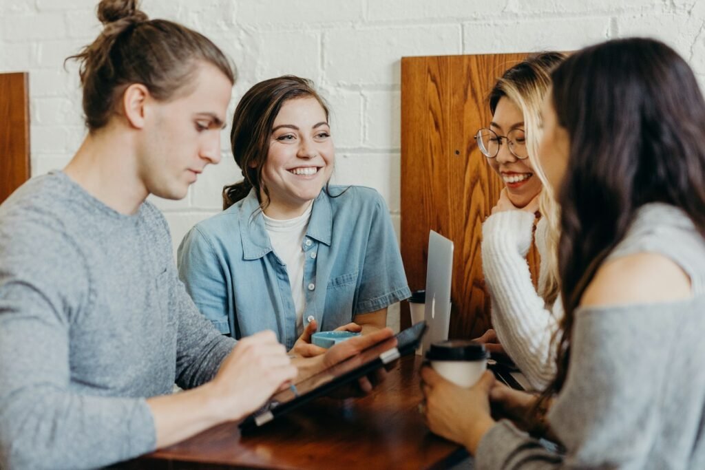 A group of friends at a coffee shop. Bridge Cultural Divides Easily