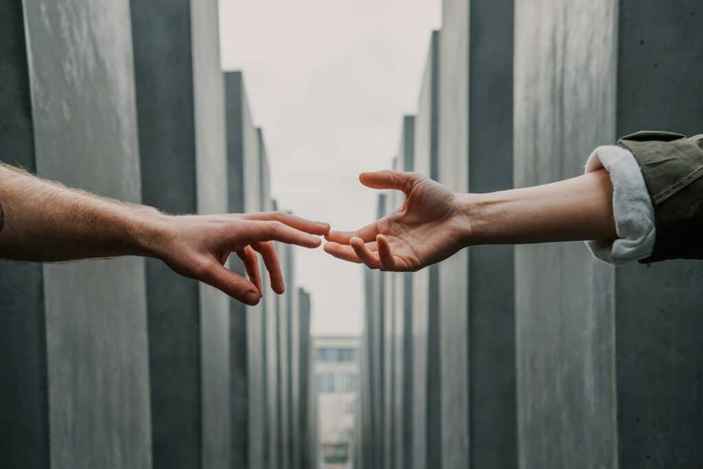 two hands. Connection. Hashtag leverage